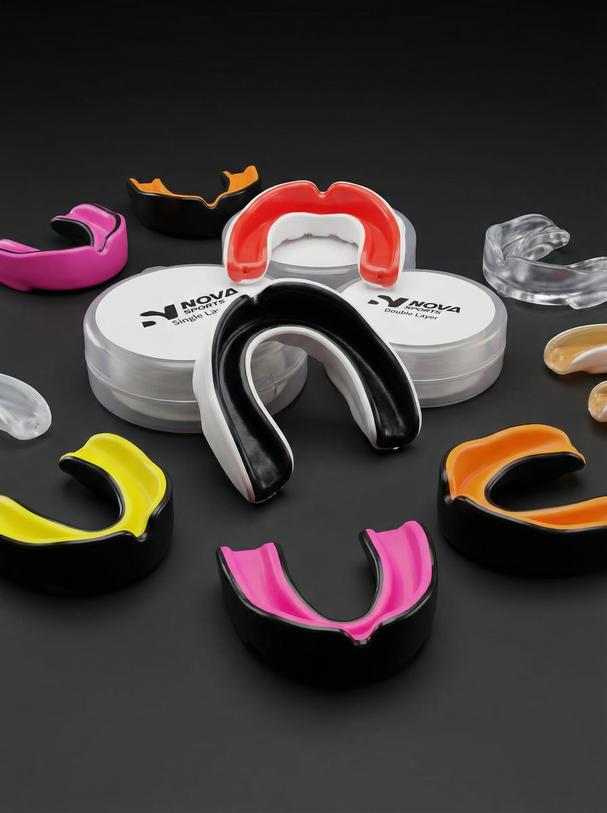 Double-layer Nova gum shields in pink, red, black and orange with their cases — Mouth Guards from Nova Sports Mauritius
