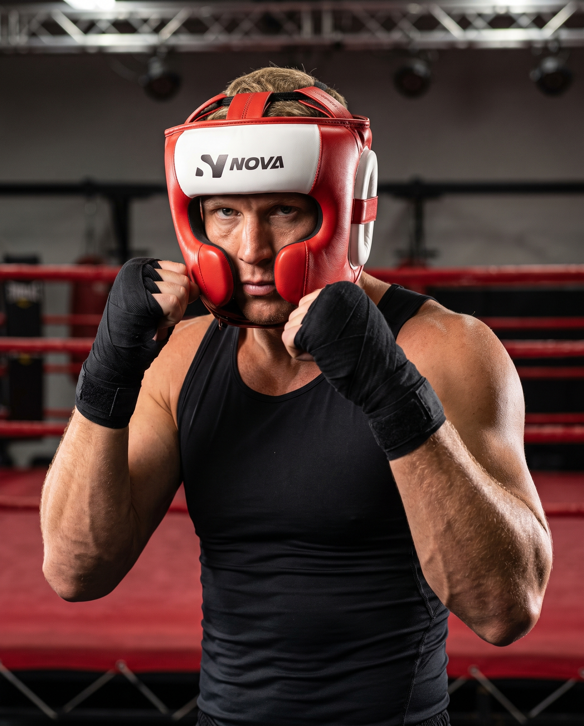 Fighter in ready stance in the ring wearing NOVA red and white pure leather head guard — Head Guards from Nova Sports Mauritius
