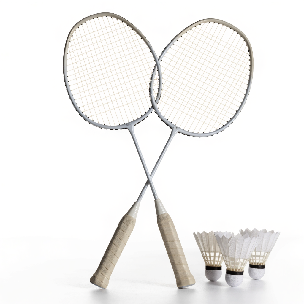 Two badminton rackets crossed with three white feather shuttlecocks — badminton sets at Nova Sports Mauritius — Games from Nova Sports Mauritius
