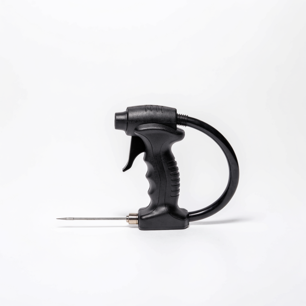 Black hand-held football air pump with hose and metal inflation needle — ball pump available at Nova Sports Mauritius — Football from Nova Sports Mauritius
