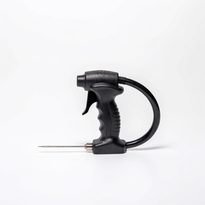 Black hand-held football air pump with hose and metal inflation needle — ball pump available at Nova Sports Mauritius — Football available in Mauritius

