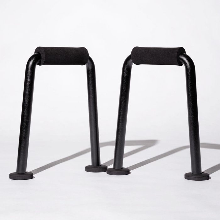 Pair of black steel push-up bars with foam grips — push up bars at Nova Sports Mauritius — Gym available in Mauritius
