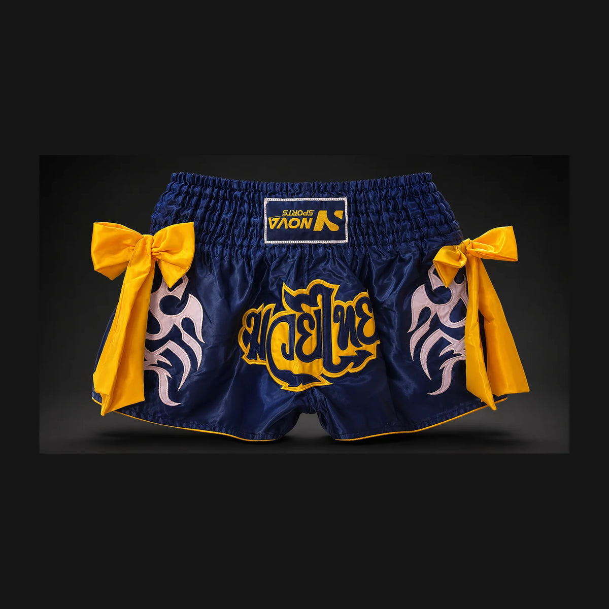 Nova navy and yellow Muay Thai shorts with tribal print and ribbon bows — Shorts from Nova Sports Mauritius

